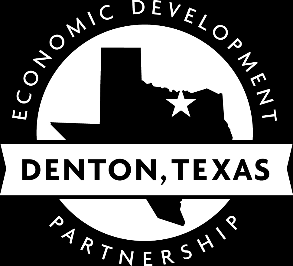 Denton TX EDC logo, a large circle with an outline of the state of Texas and a star where the city of Denton is located